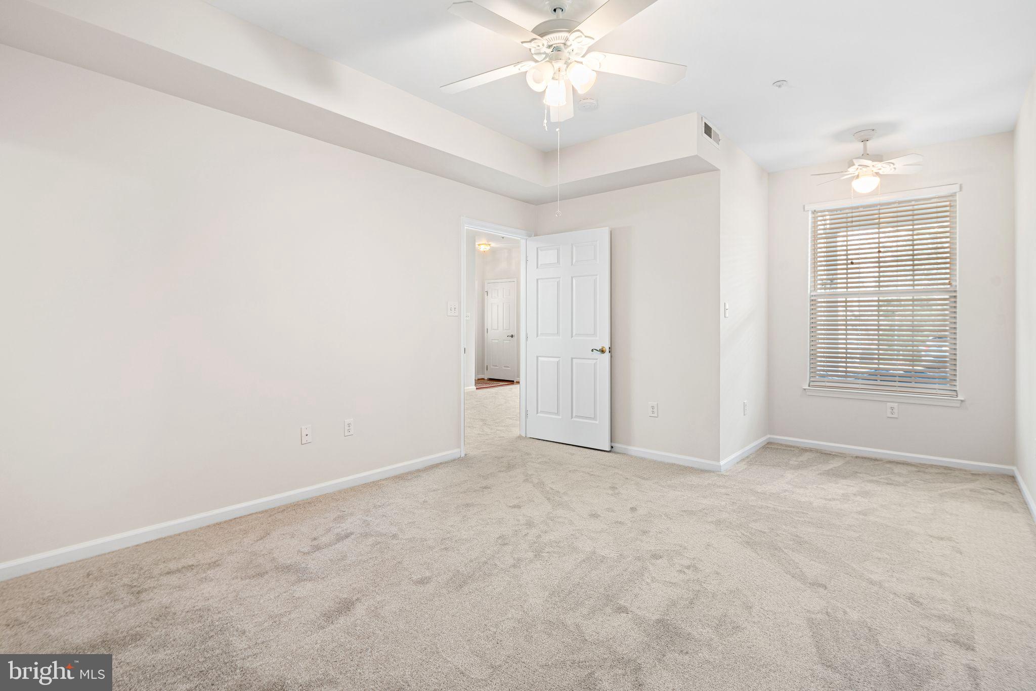 1364 Nicklaus Drive Springfield, PA 19064 - Photo 22 of 25 an empty room with fan and entrance