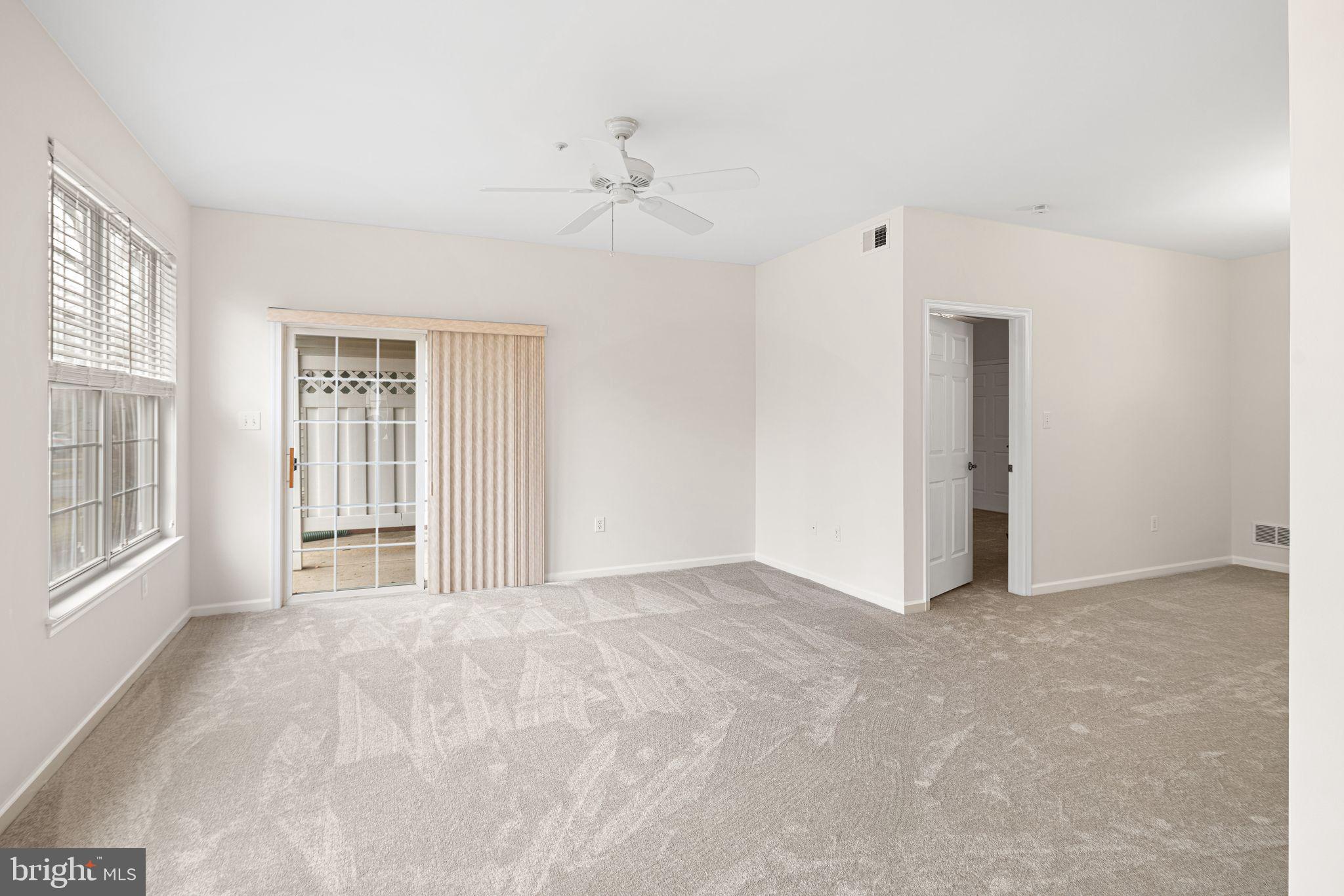 1364 Nicklaus Drive Springfield, PA 19064 - Photo 4 of 25 a view of an empty room with a window