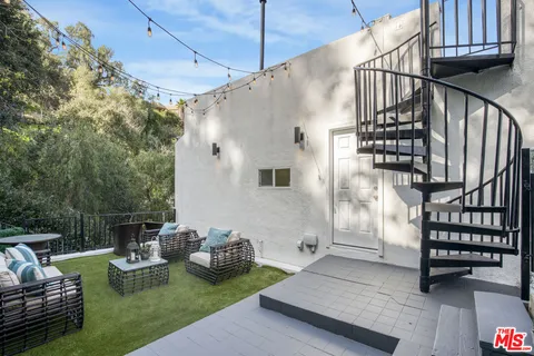 a view of yard from outdoor seating