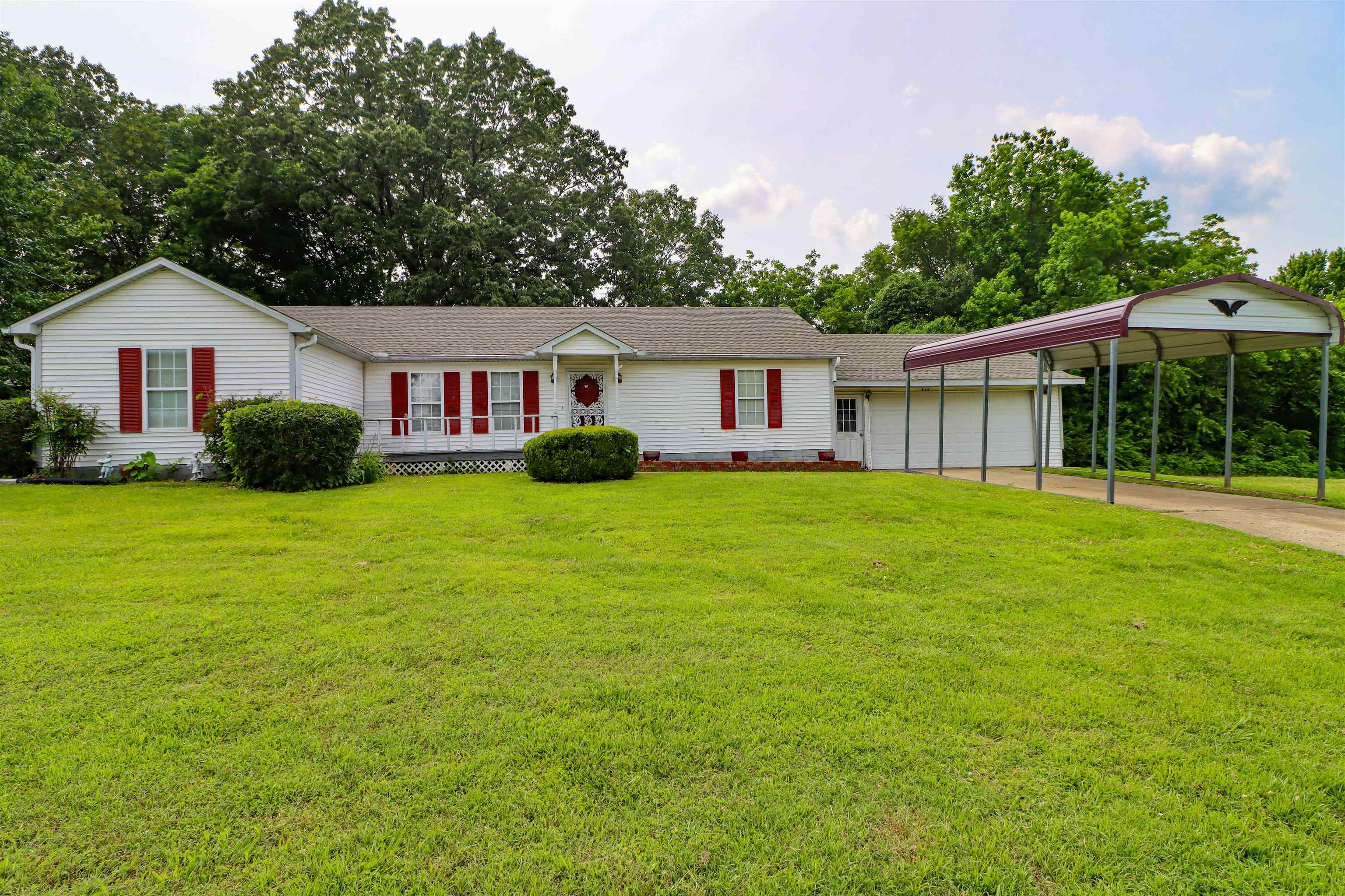 319 Jordan Street Ripley, TN 38063 - Photo 1 of 33 a view of a house with a yard