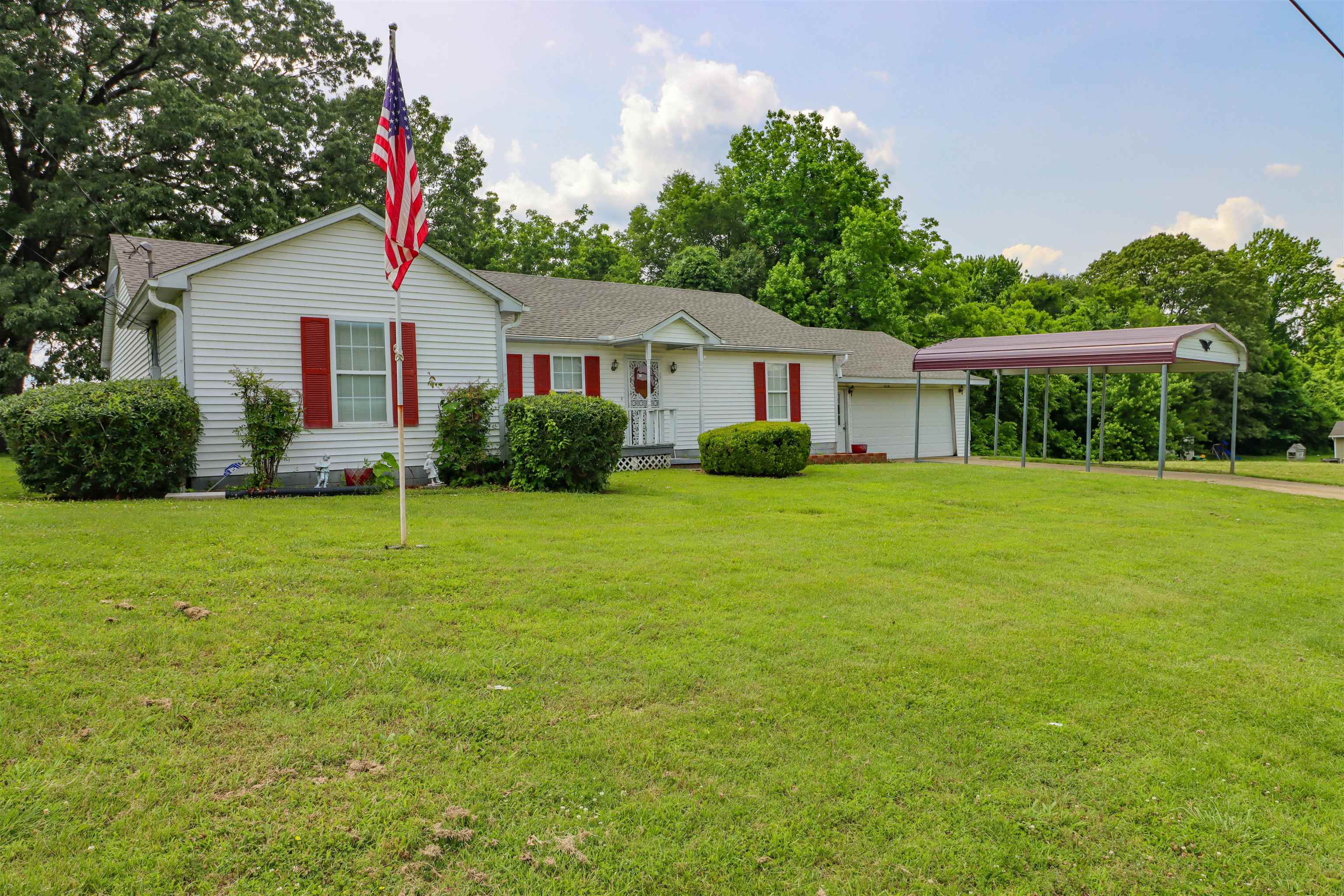 319 Jordan Street Ripley, TN 38063 - Photo 31 of 33 a front view of a house with garden