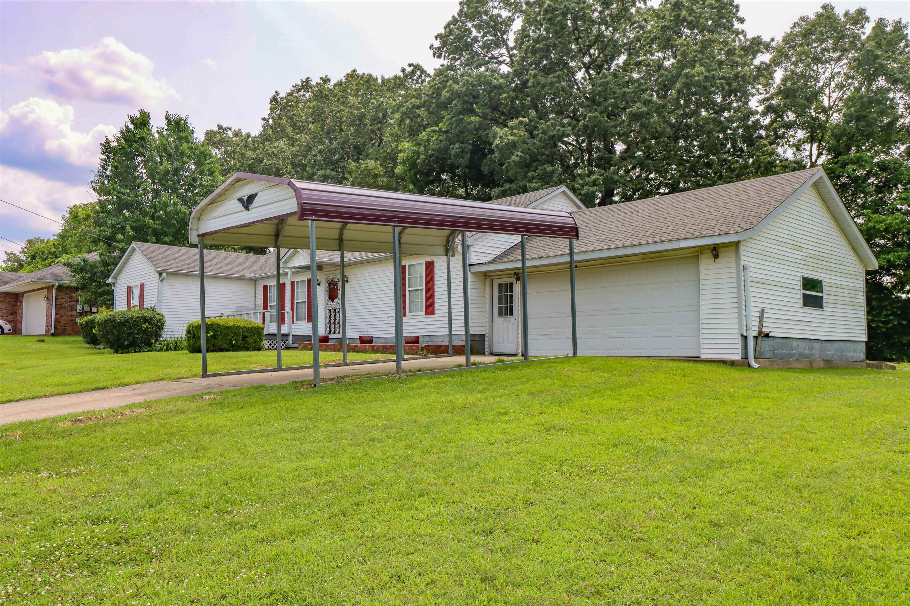 319 Jordan Street Ripley, TN 38063 - Photo 33 of 33 a view of a house with a yard and sitting area