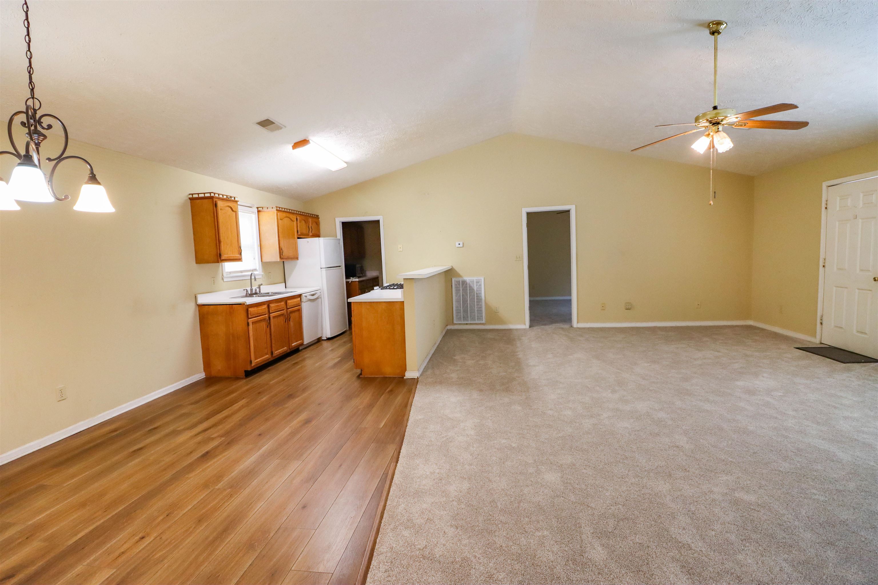 319 Jordan Street Ripley, TN 38063 - Photo 5 of 33 a view of a kitchen with a sink and a refrigerator