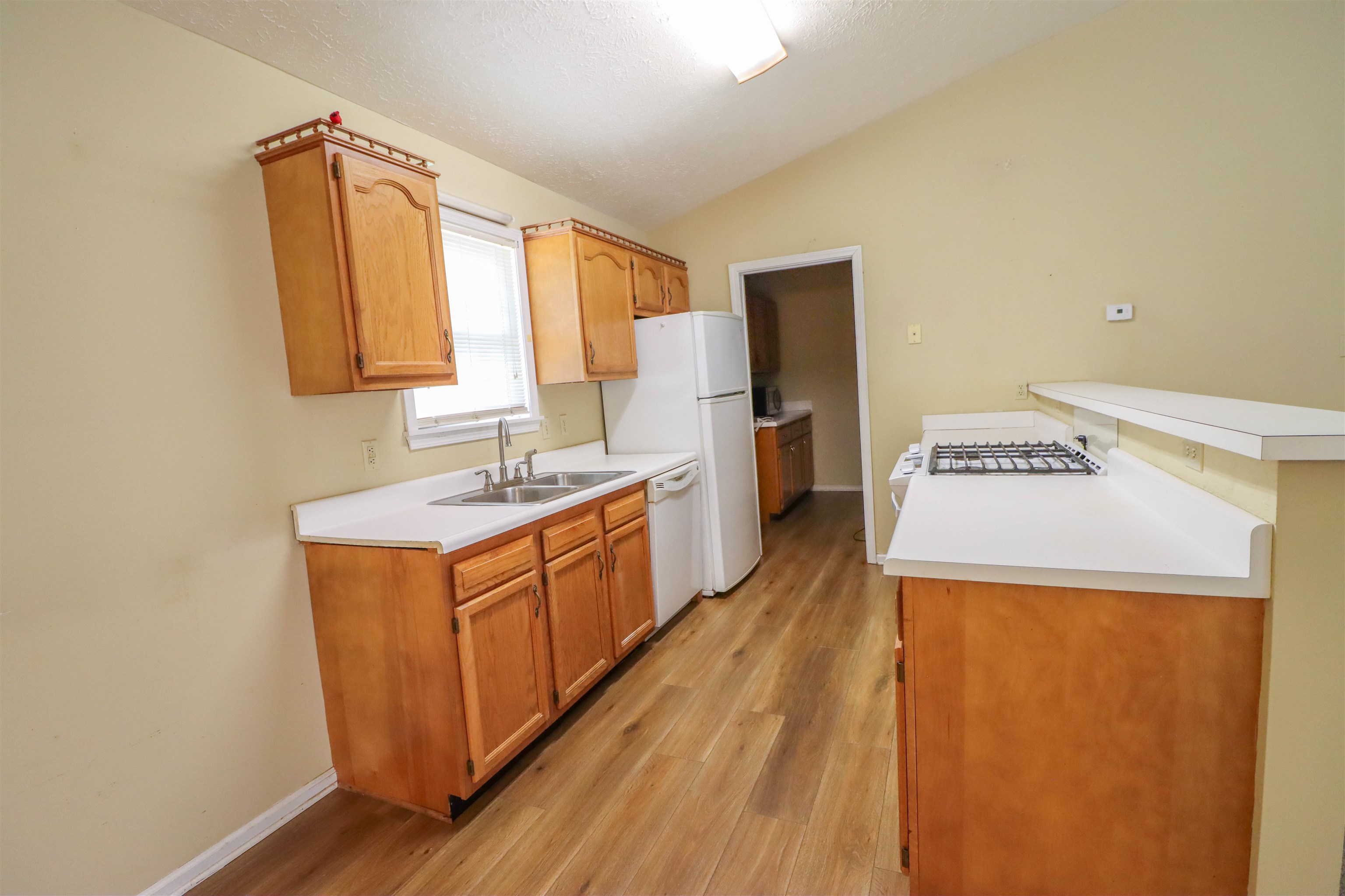 319 Jordan Street Ripley, TN 38063 - Photo 6 of 33 a view of a kitchen with electric appliances