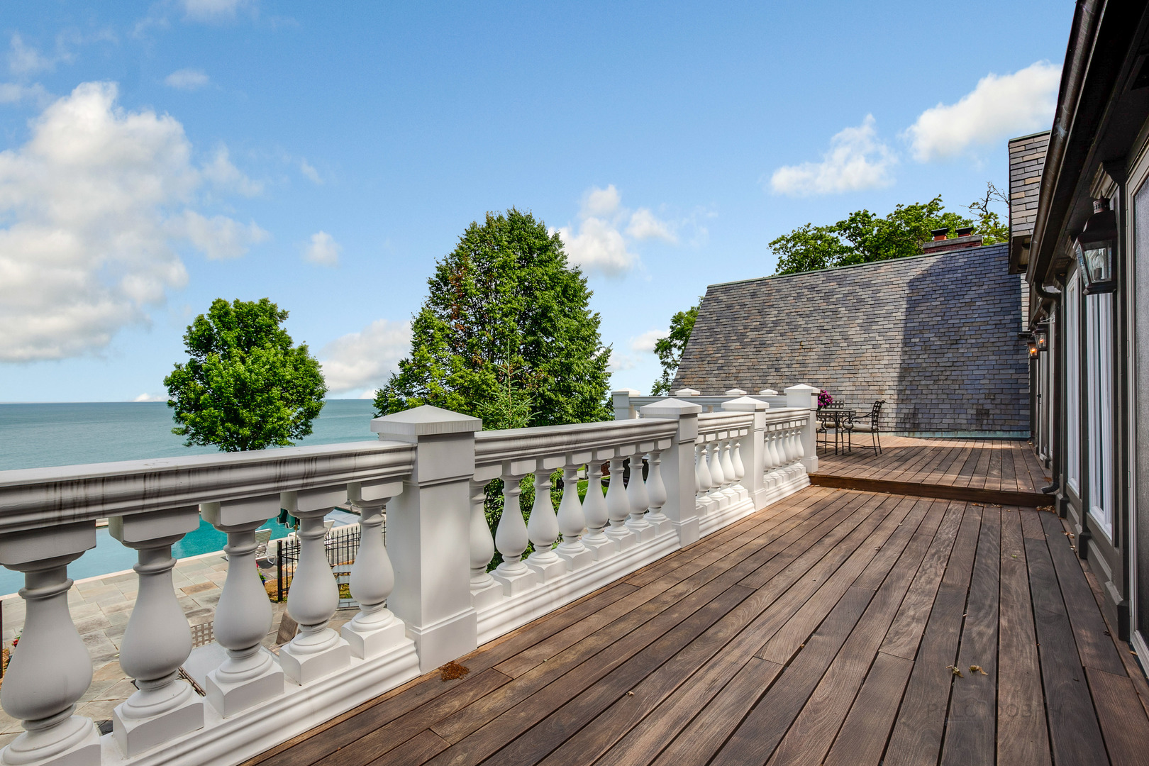 670 Arden Shore Road Lake Bluff, IL 60044 - Photo 19 of 56 a view of balcony with wooden floor and seating space
