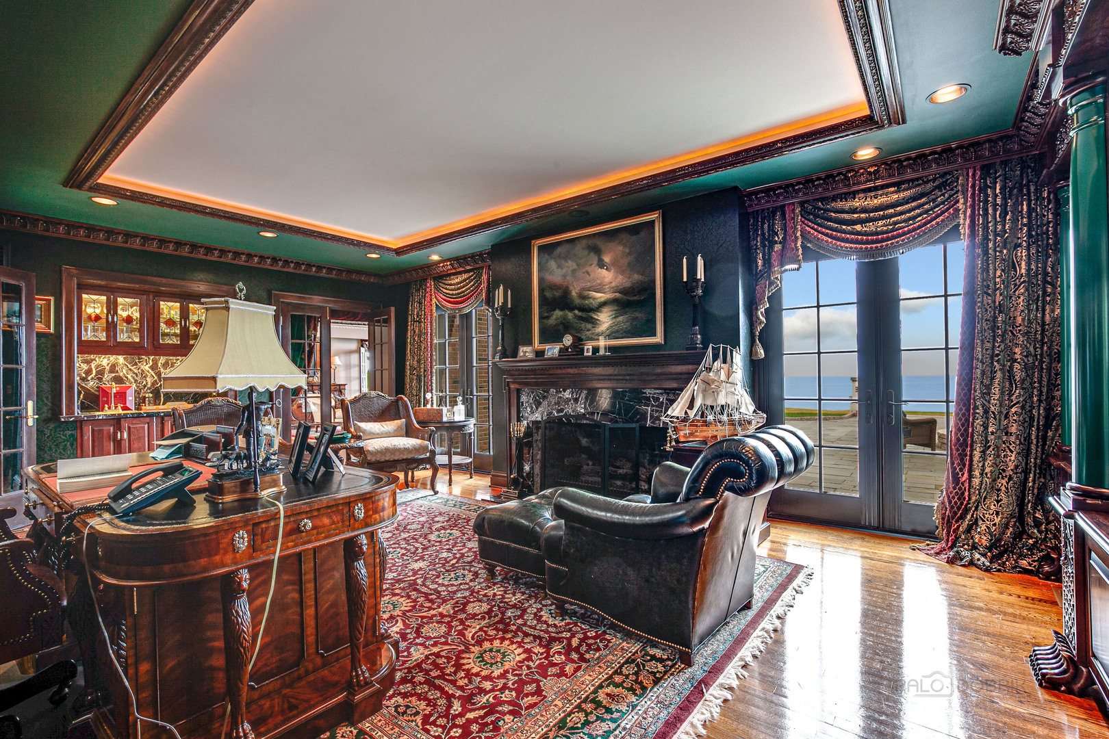 670 Arden Shore Road Lake Bluff, IL 60044 - Photo 23 of 56 a living room with furniture and a fireplace