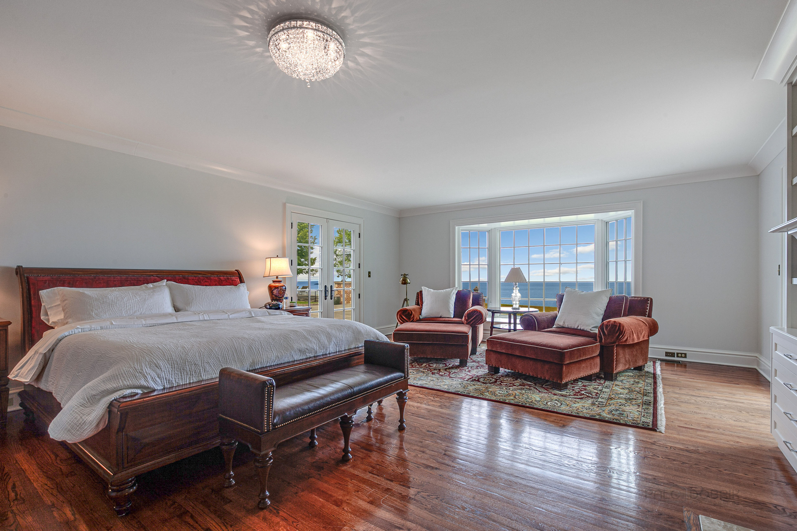 670 Arden Shore Road Lake Bluff, IL 60044 - Photo 25 of 56 a bedroom with a bed and wooden floor