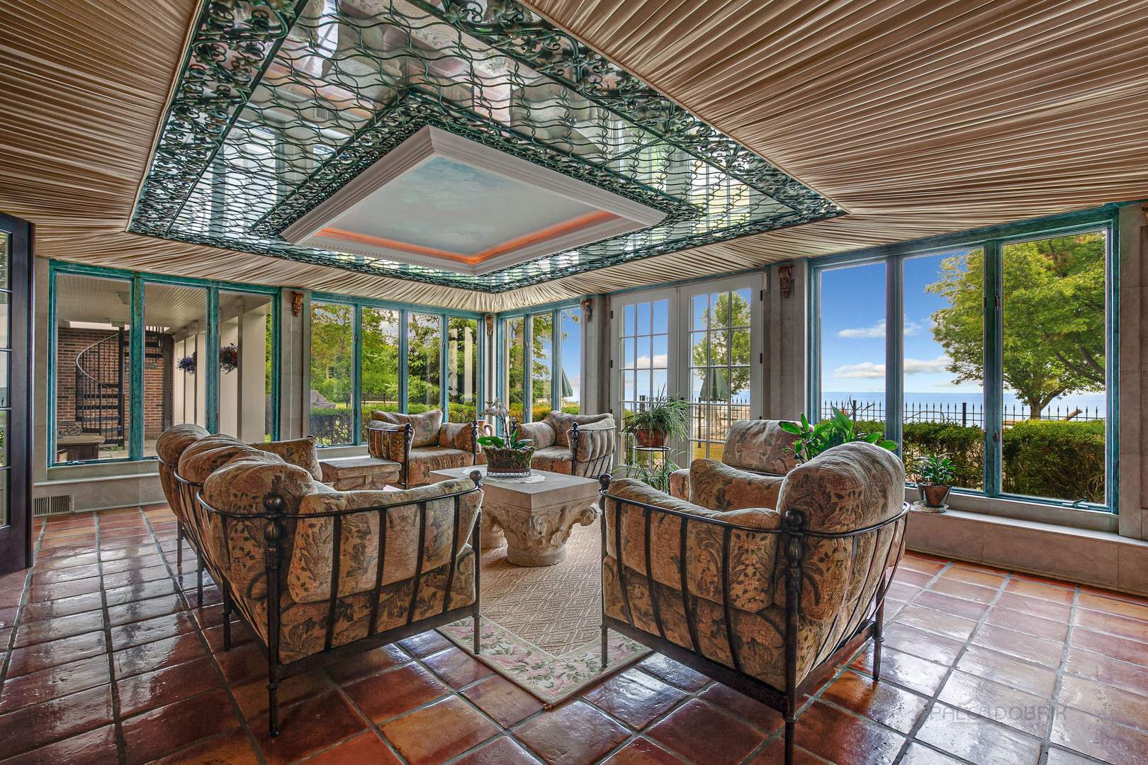 670 Arden Shore Road Lake Bluff, IL 60044 - Photo 7 of 56 a balcony with furniture and wooden floor