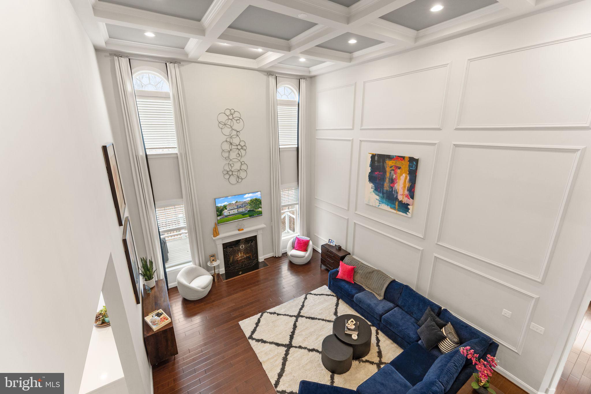 41865 Paddock Gate Place Ashburn, VA 20148 - Photo 16 of 99 a view of living room with furniture and a fireplace