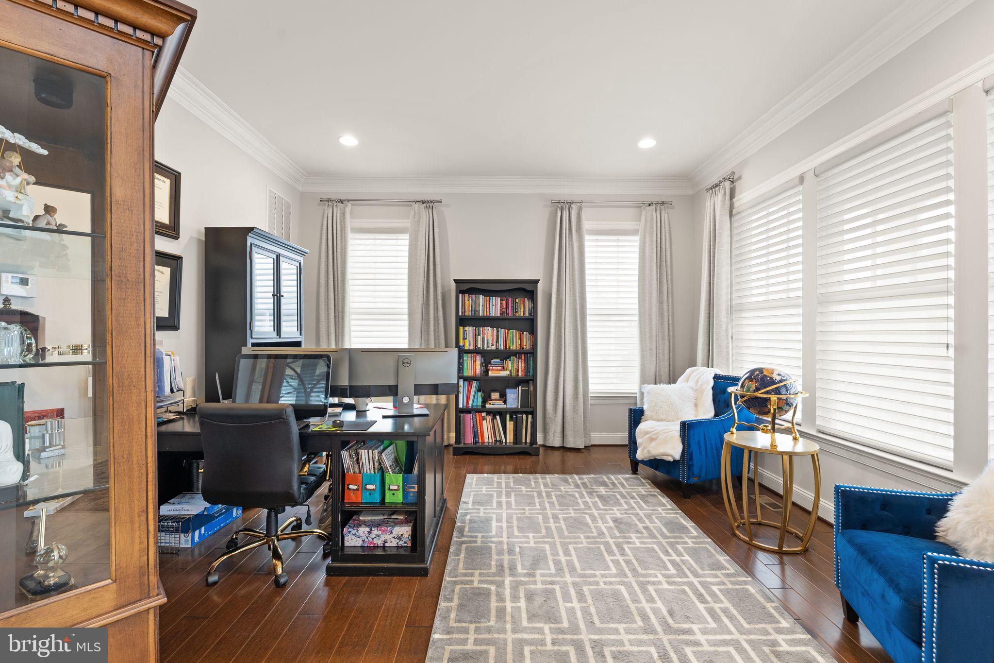 41865 Paddock Gate Place Ashburn, VA 20148 - Photo 28 of 99 a living room with furniture and wooden floor