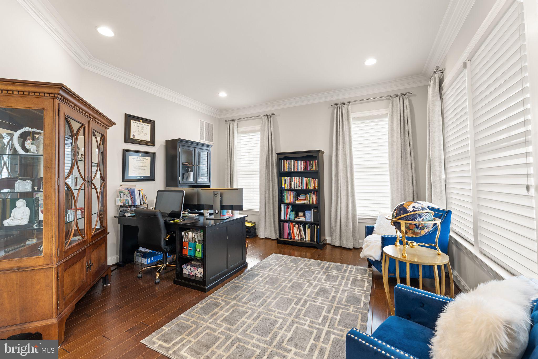 41865 Paddock Gate Place Ashburn, VA 20148 - Photo 29 of 99 a living room with furniture and dresser with wooden floor