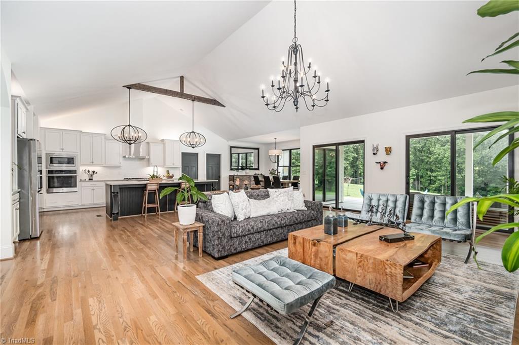 2519 Rivers Edge Road Summerfield, NC 27358 - Photo 41 of 42 Open floor plan looking into kitchen from living room
