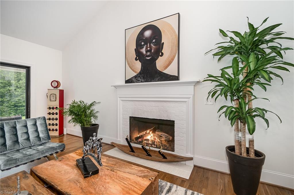 2519 Rivers Edge Road Summerfield, NC 27358 - Photo 13 of 42 Living room with gas fireplace