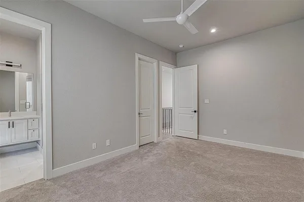 an empty room with closet area