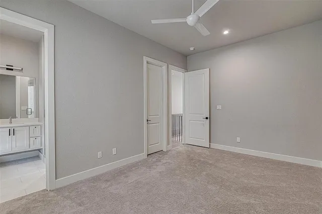 an empty room with closet area