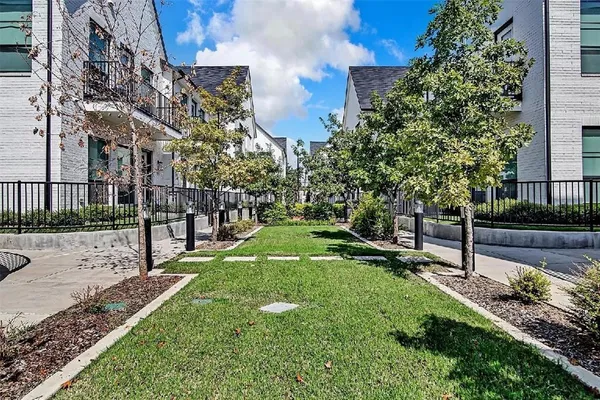 a view of a park with swings