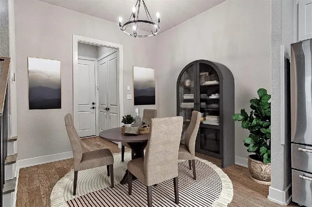 a view of a dining room with furniture