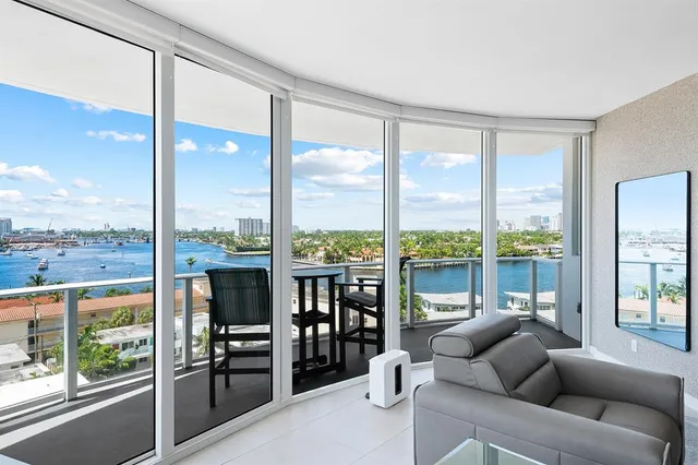 a living room with furniture city view