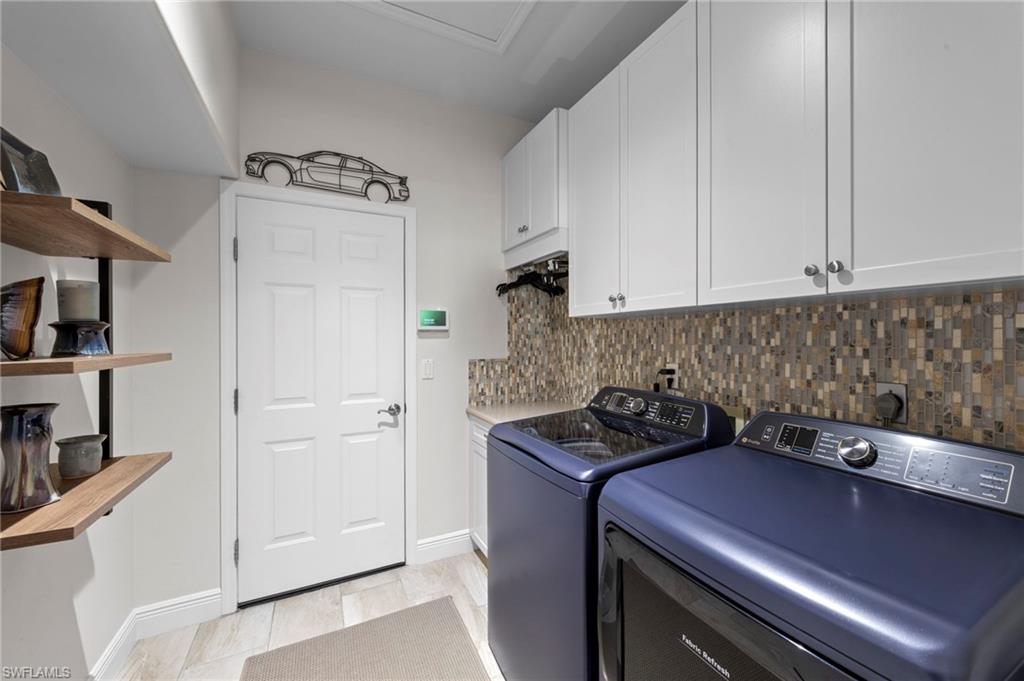 20741 Rivers Ford Estero, FL 33928 - Photo 22 of 50 a kitchen with a sink and cabinets