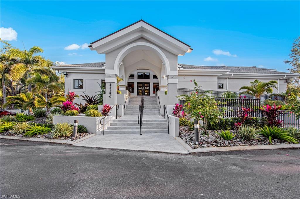 20741 Rivers Ford Estero, FL 33928 - Photo 35 of 50 a front view of a house with a yard