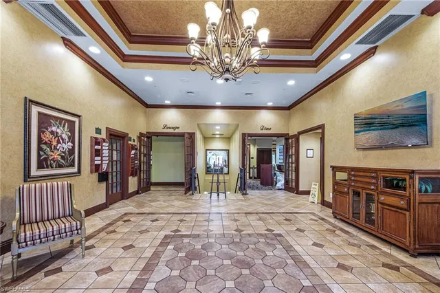 a view of a hallway with a chandelier