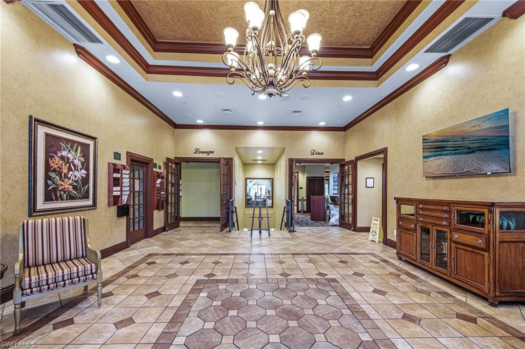 20741 Rivers Ford Estero, FL 33928 - Photo 36 of 50 a view of a hallway with a chandelier
