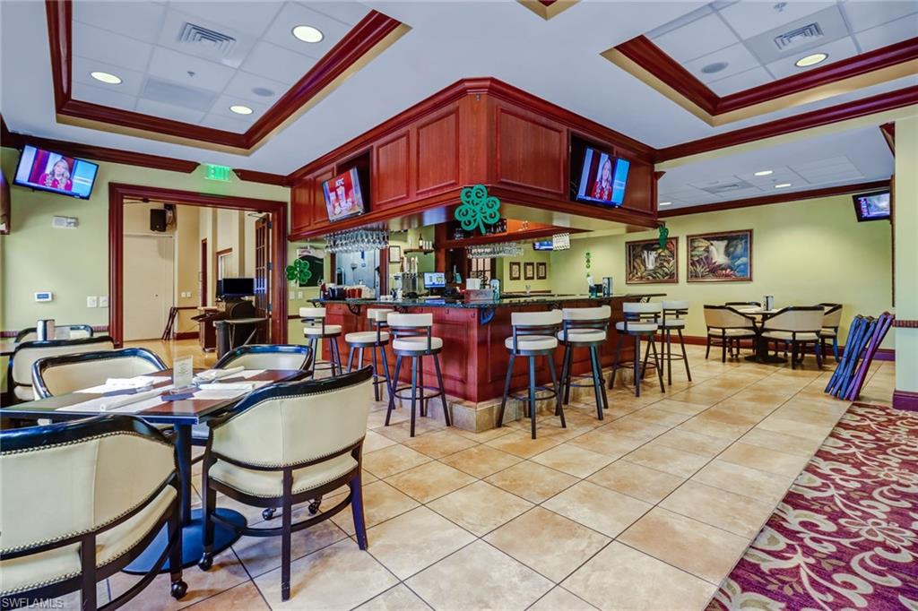 20741 Rivers Ford Estero, FL 33928 - Photo 37 of 50 a group of people sitting outside of a building