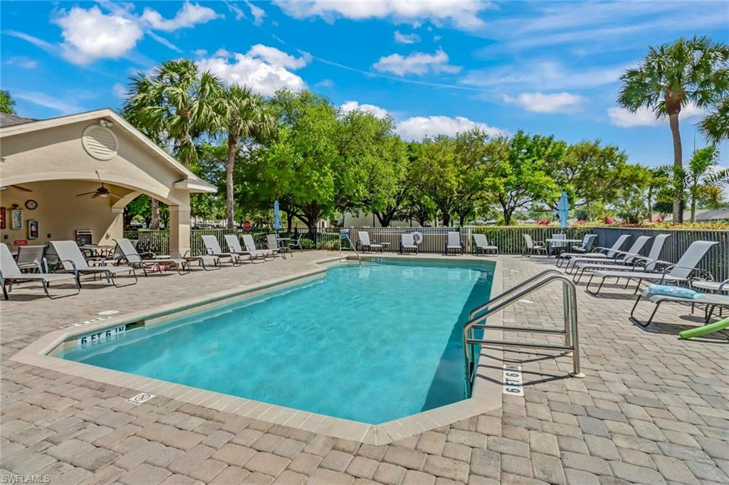 20741 Rivers Ford Estero, FL 33928 - Photo 42 of 50 a view of a swimming pool with a lounge chair