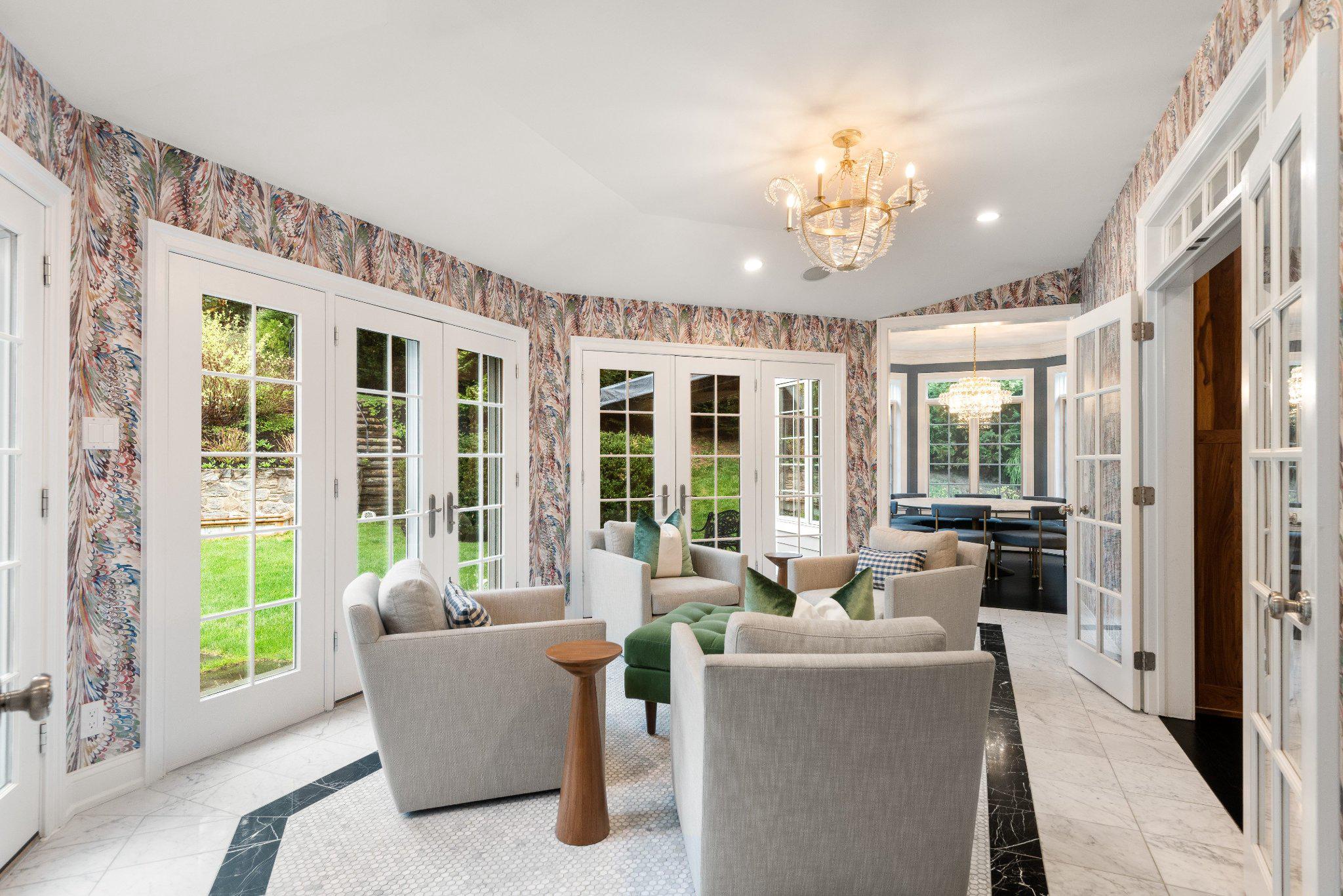 952 Lafayette Road Bryn Mawr, PA 19010 - Photo 22 of 87 Cheerful marbled feather wallpaper in the sunroom
