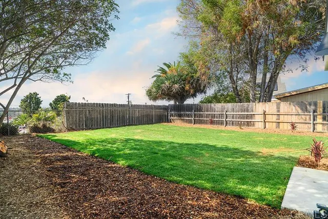 a view of a backyard with a garden