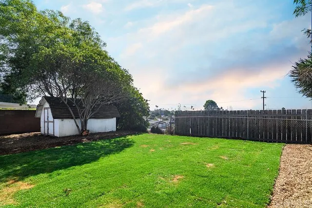 a view of a backyard with a garden