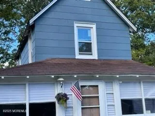 a front view of a house with a garage