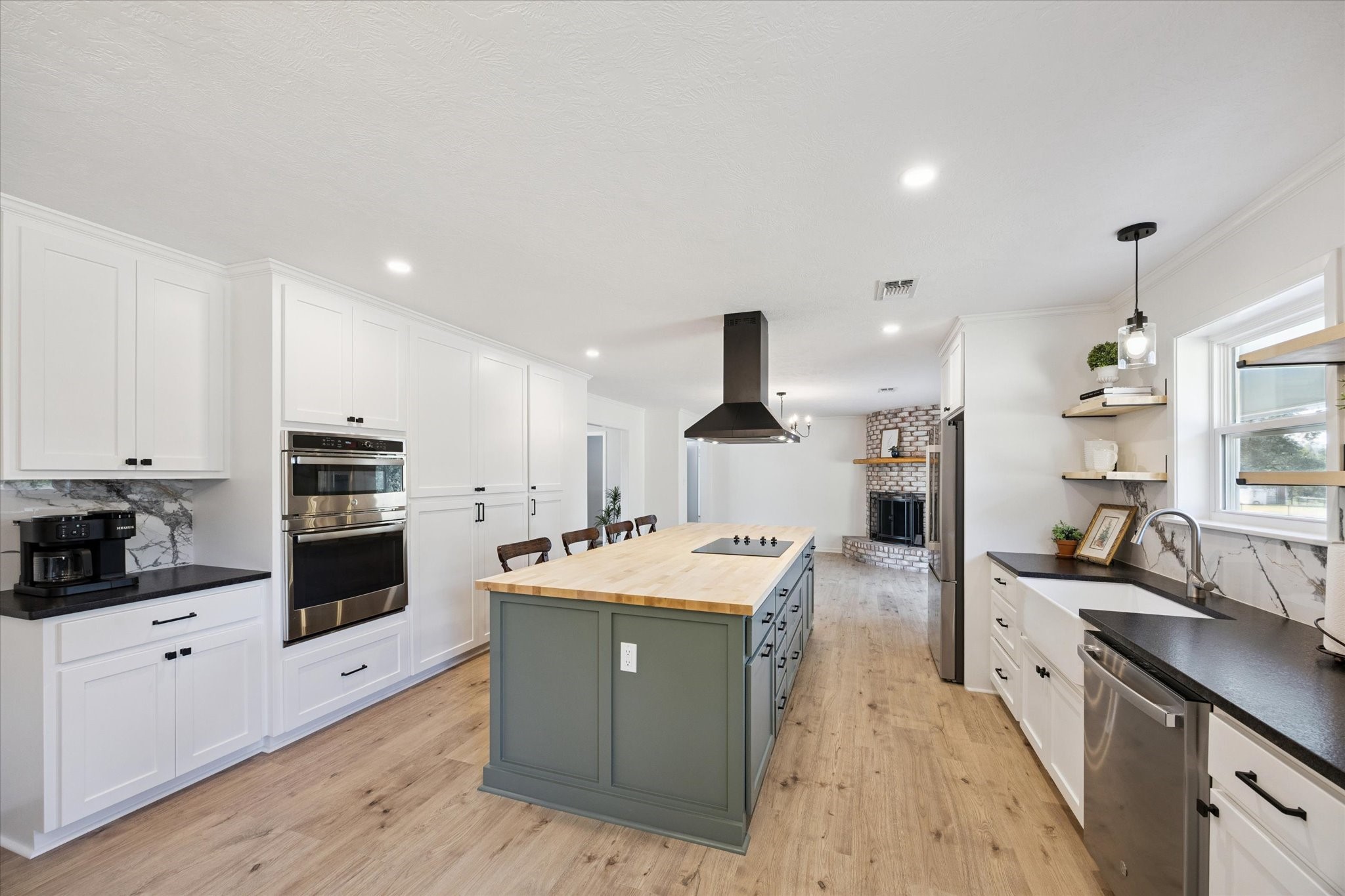 3455 Farm To Market 1948 Burton, TX 77835 - Photo 8 of 29 a large kitchen with stainless steel appliances and a stove