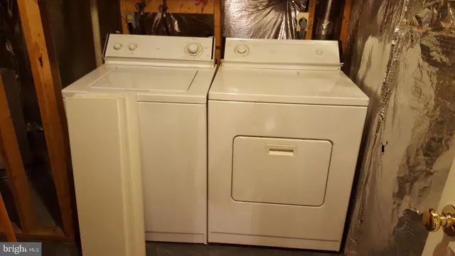 a utility room with dryer and washer