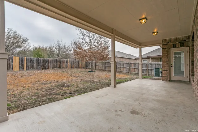 a view of back yard and porch