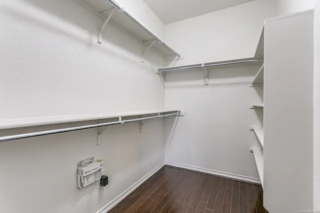 a view of a room with racks on the wall