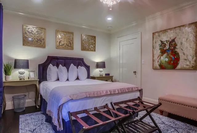 a view of hall way with furniture