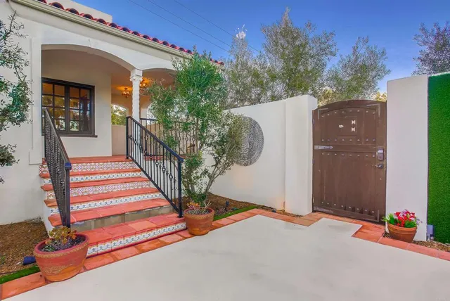a view of entryway livingroom and hall with wooden floor
