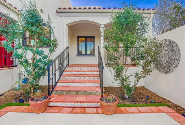 a view of swimming pool with a lounge chairs