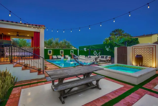 a view of swimming pool with chairs