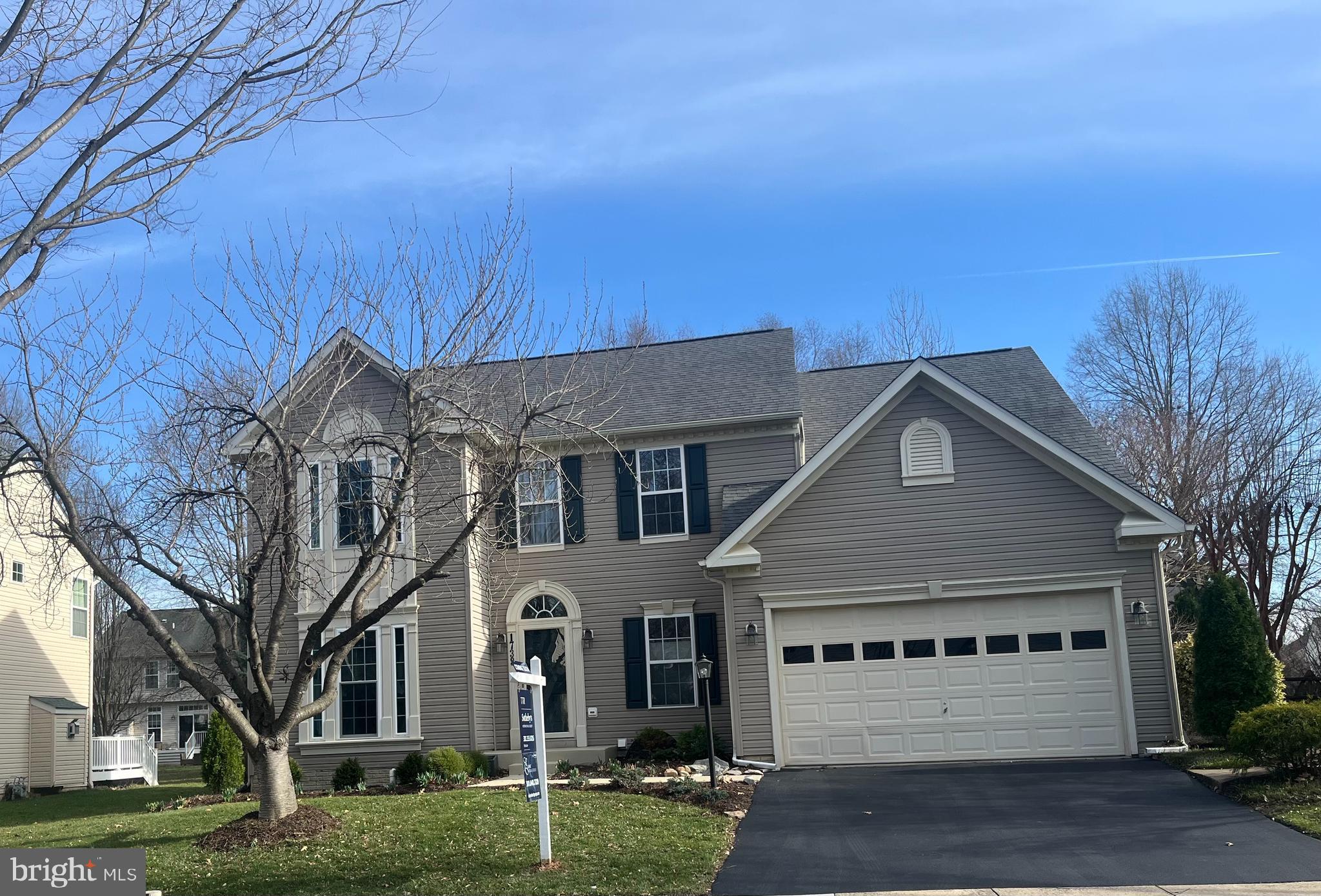 1733 Dearbought Drive Frederick, MD 21701 - Photo 2 of 7 front view of a house with a yard