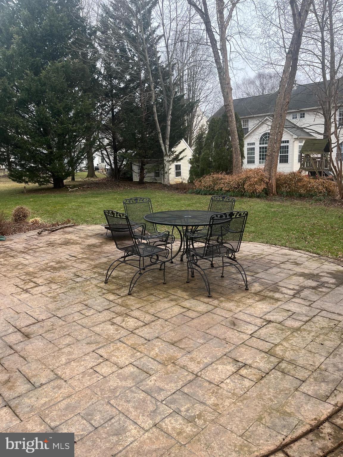 1733 Dearbought Drive Frederick, MD 21701 - Photo 3 of 7 a view of a house with backyard sitting area and garden