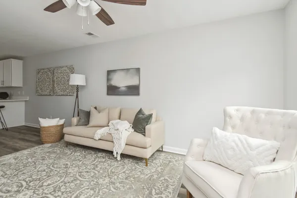 a living room with furniture and a couch