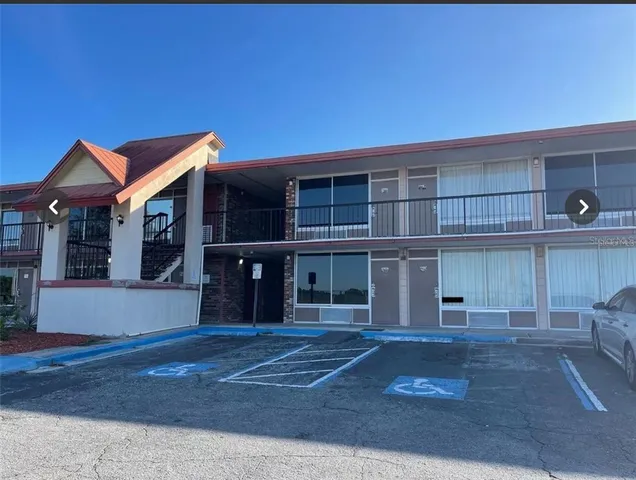 a view of a brick building from a balcony