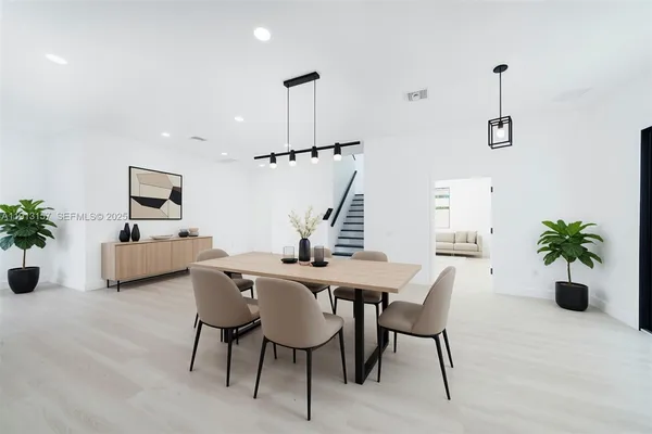 a view of a dining room with furniture