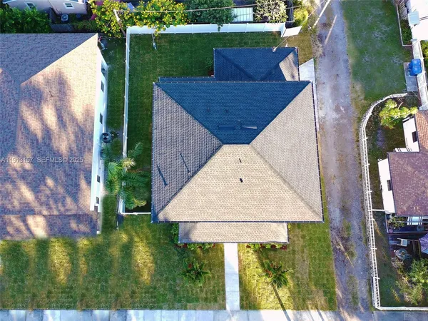 an aerial view of a house having yard
