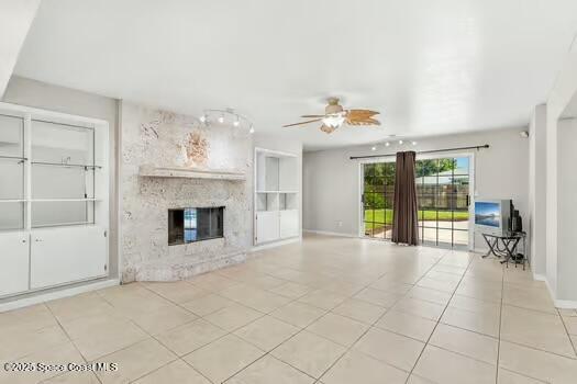 933 Waialae Circle Northeast Palm Bay, FL 32905 - Photo 25 of 32 a view of an empty room with a fireplace