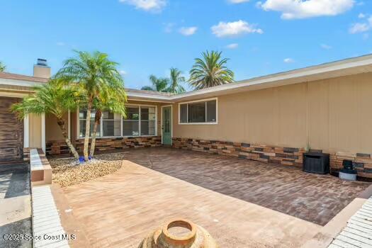 933 Waialae Circle Northeast Palm Bay, FL 32905 - Photo 3 of 32 a view of a backyard of the house