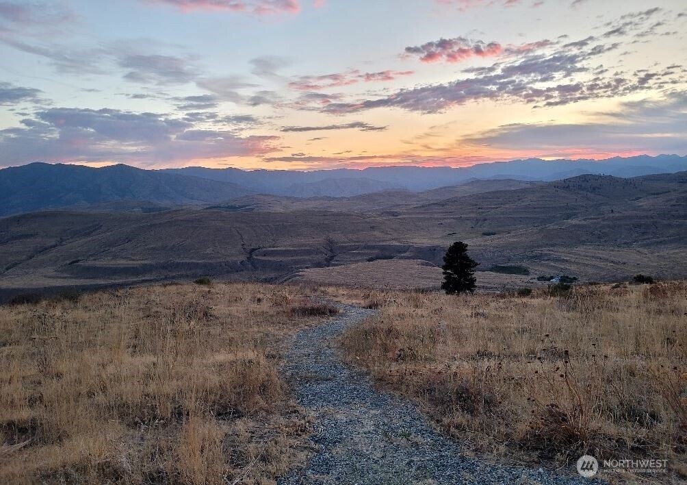 180 Harmony Heights Road Brewster, WA 98812 - Photo 11 of 13 a view of an outdoor space and mountain view