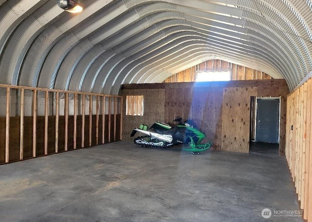 180 Harmony Heights Road Brewster, WA 98812 - Photo 8 of 13 a view of parking garage